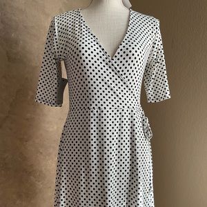 Fun poke-a-dot faux wrap dress